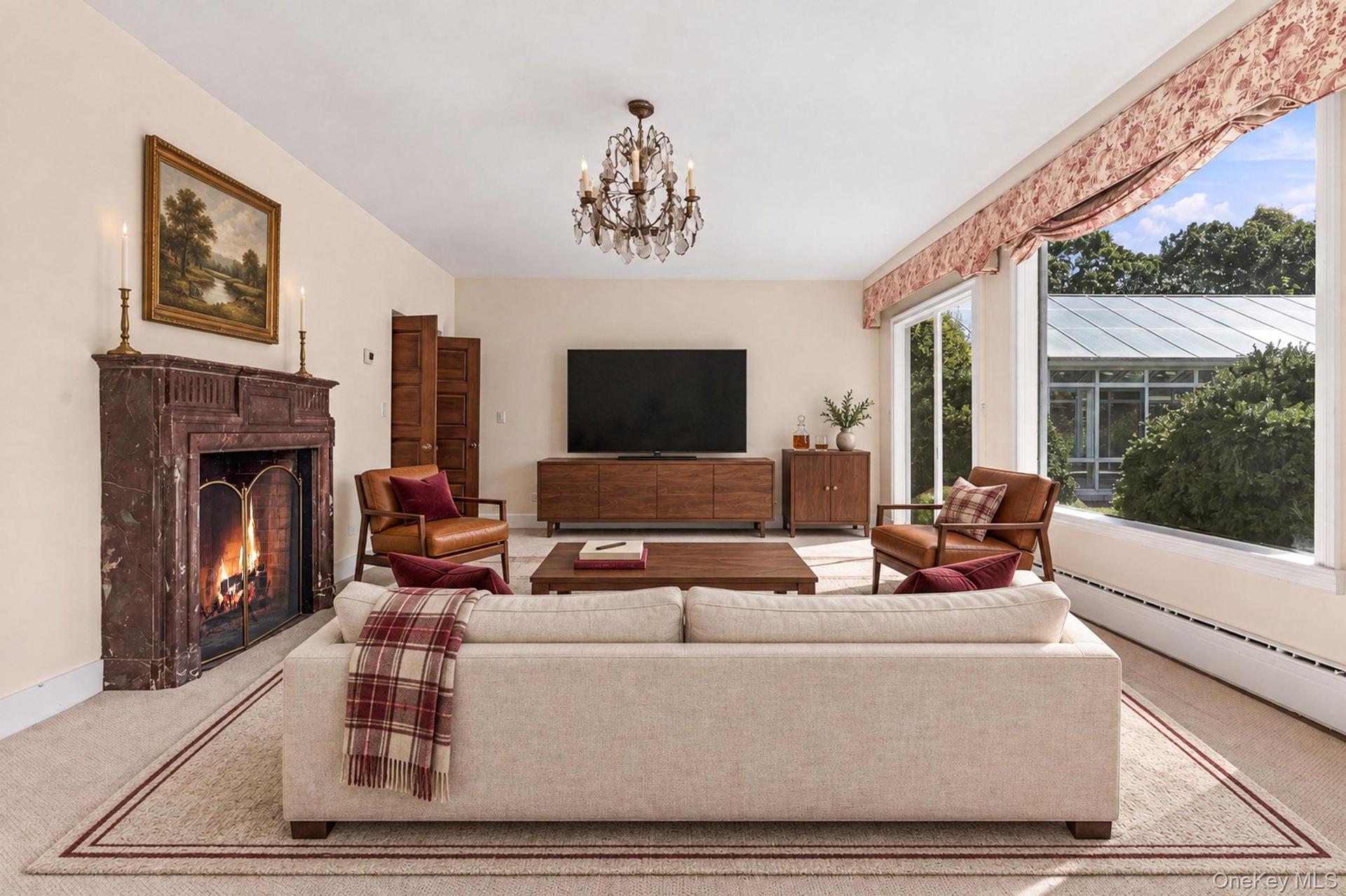 On the Lower Level with door out to Gardens, Terrace & Pool. (Virtually Staged)