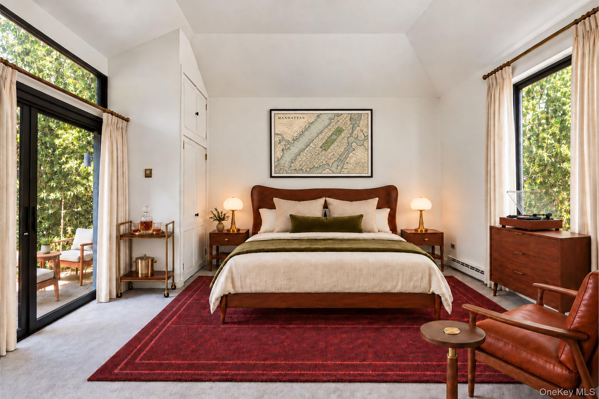 Primary Bedroom with slider out to patio in Teahouse Guest House (Virtually Staged)