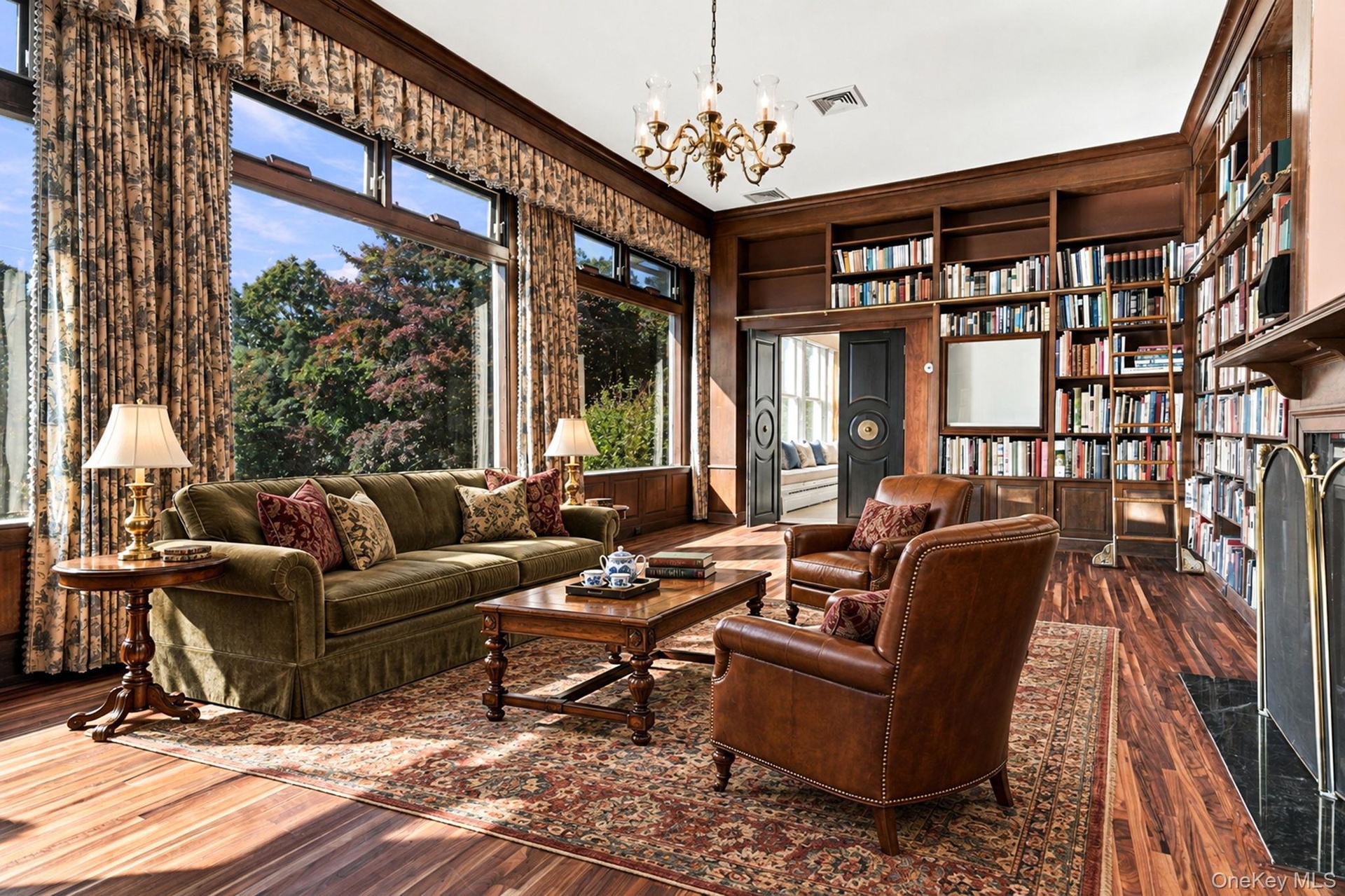 Views to the terrace below. Freshly Refinished Floors. (Vitually Staged - Except for Books & drapes))