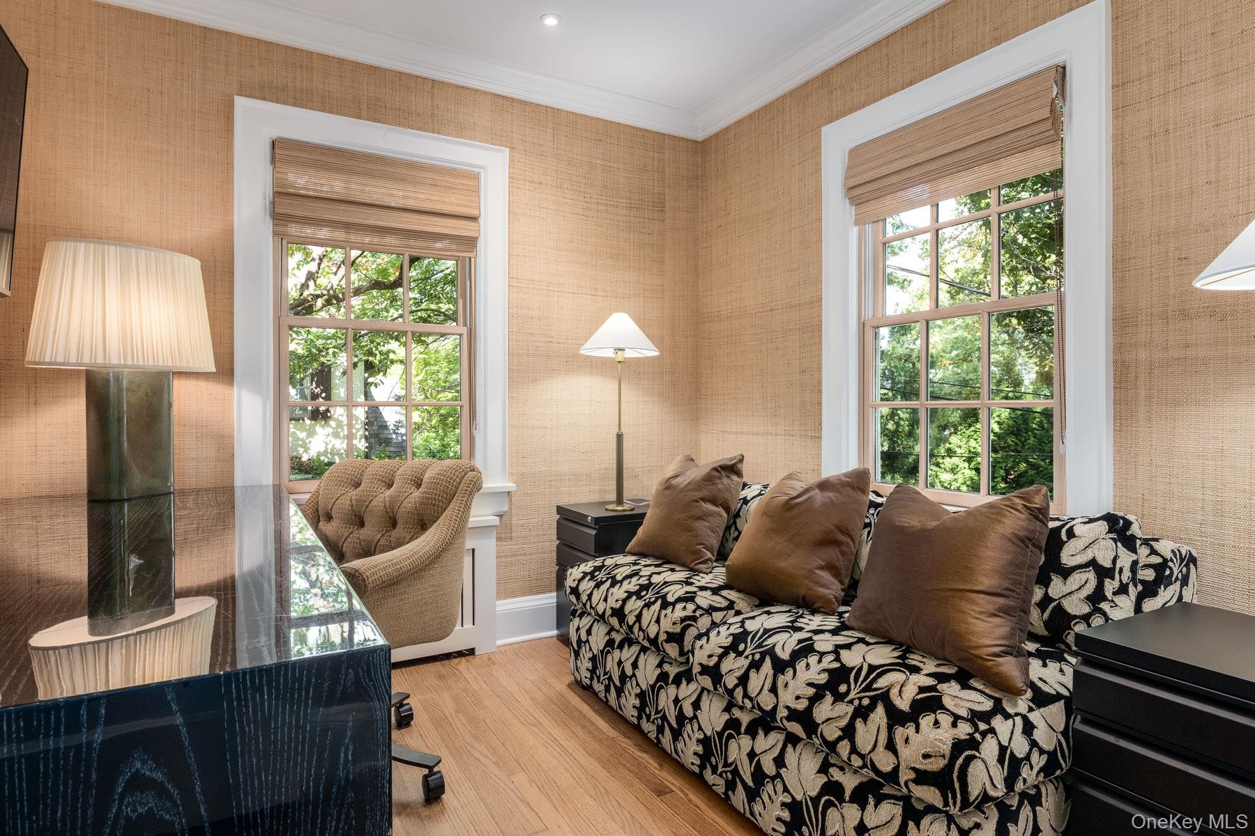 This is Bedroom 4 located on the second level being used as an office.