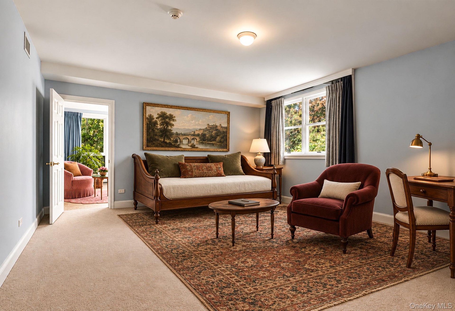 On Lower Level with a hall of Closets & a Full Bath. (Virtually Staged)