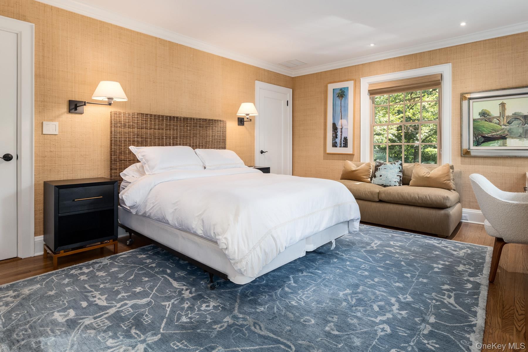 Second Level Primary Bedroom with recessed lighting, and hardwood floors.