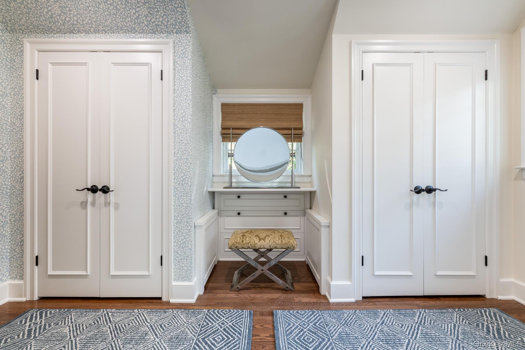 Dressing Room featuring 4 closets.