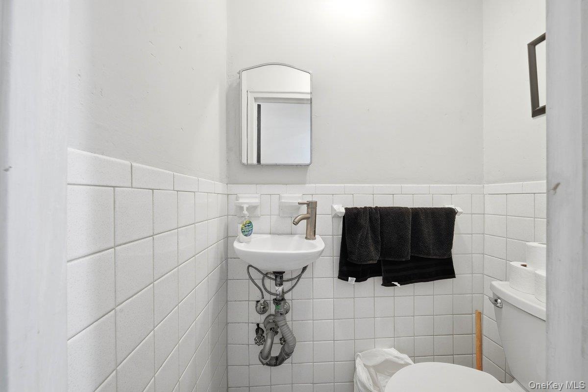 Powder room - (First Fl)