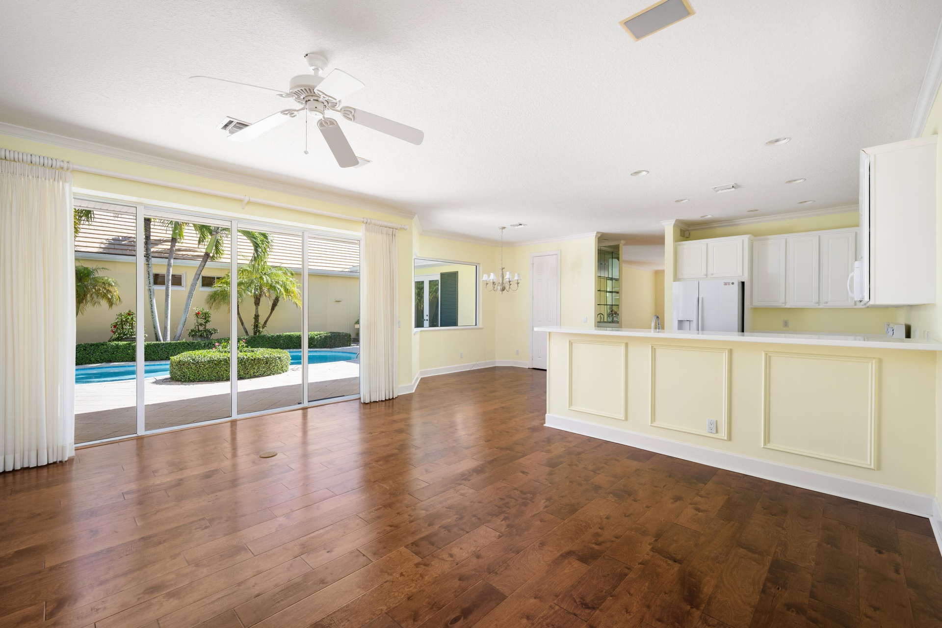 Enjoy cooking and entertaining? Cozy or formal? This home has it all including fully opening sliders to pool