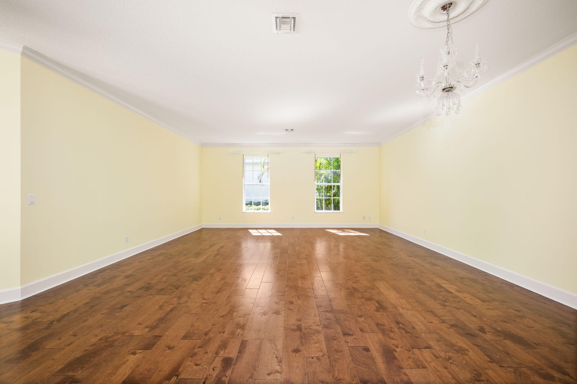 extended living room, wood floors, dining room front foyer and wet bar