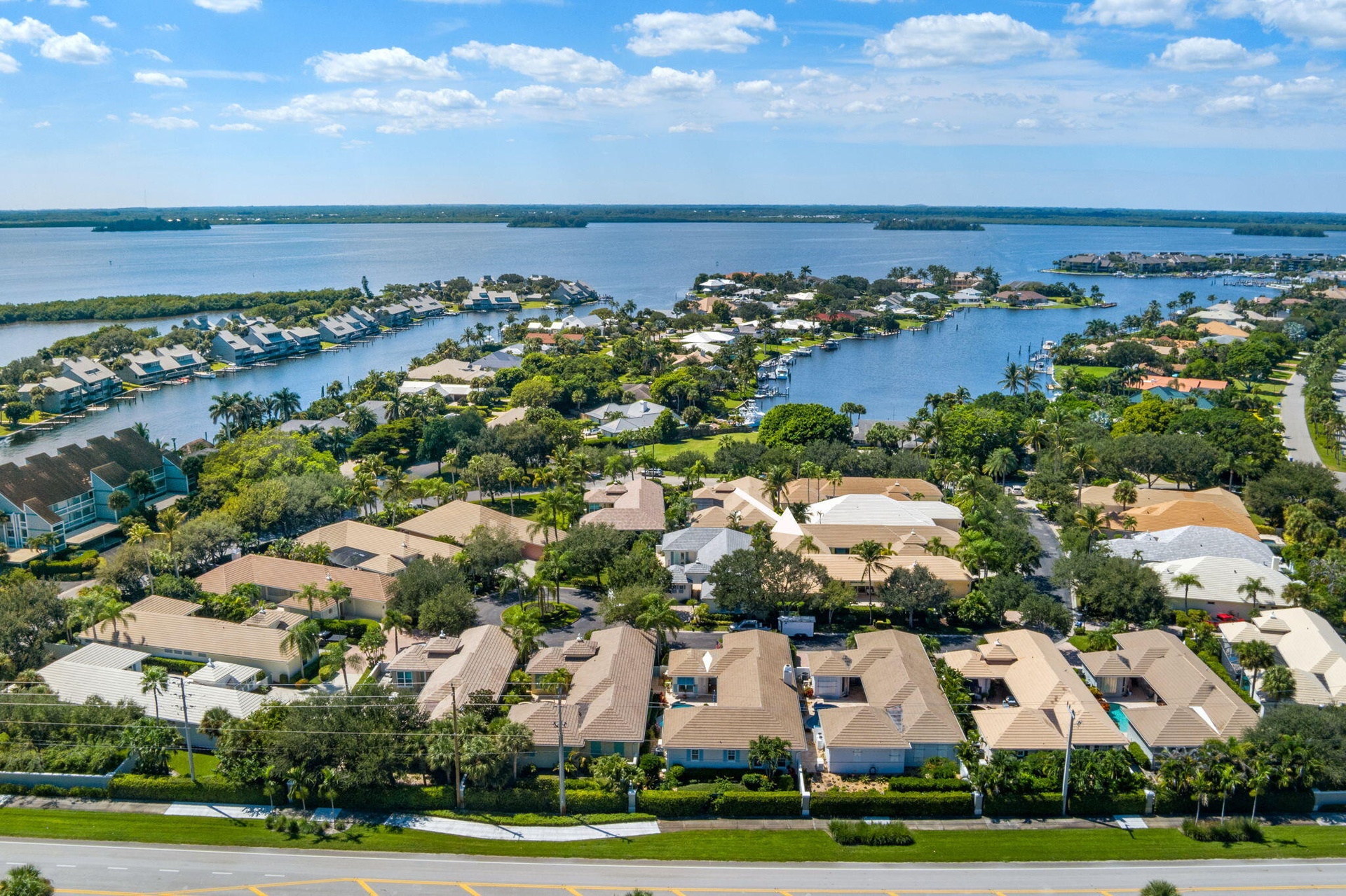 Nestled in the middle of this desired community between ocean and river