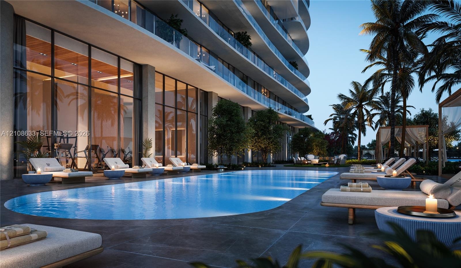 Outdoor swimming pool featuring stone-tile decking, full-height glass window walls, and manicured palm tree landscaping