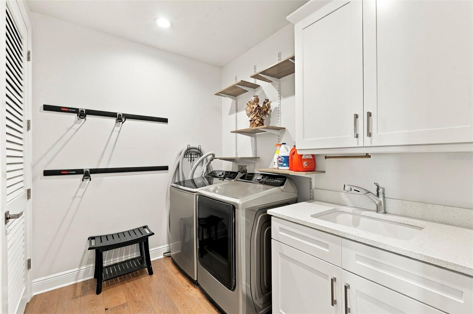 Laundry room with full sized washer and dryer