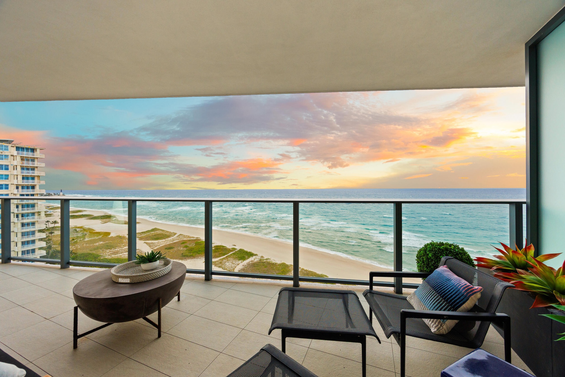 The expansive wraparound balcony offers an exceptional amount of outdoor living space and a peaceful setting to unwind with family and friends. As eve