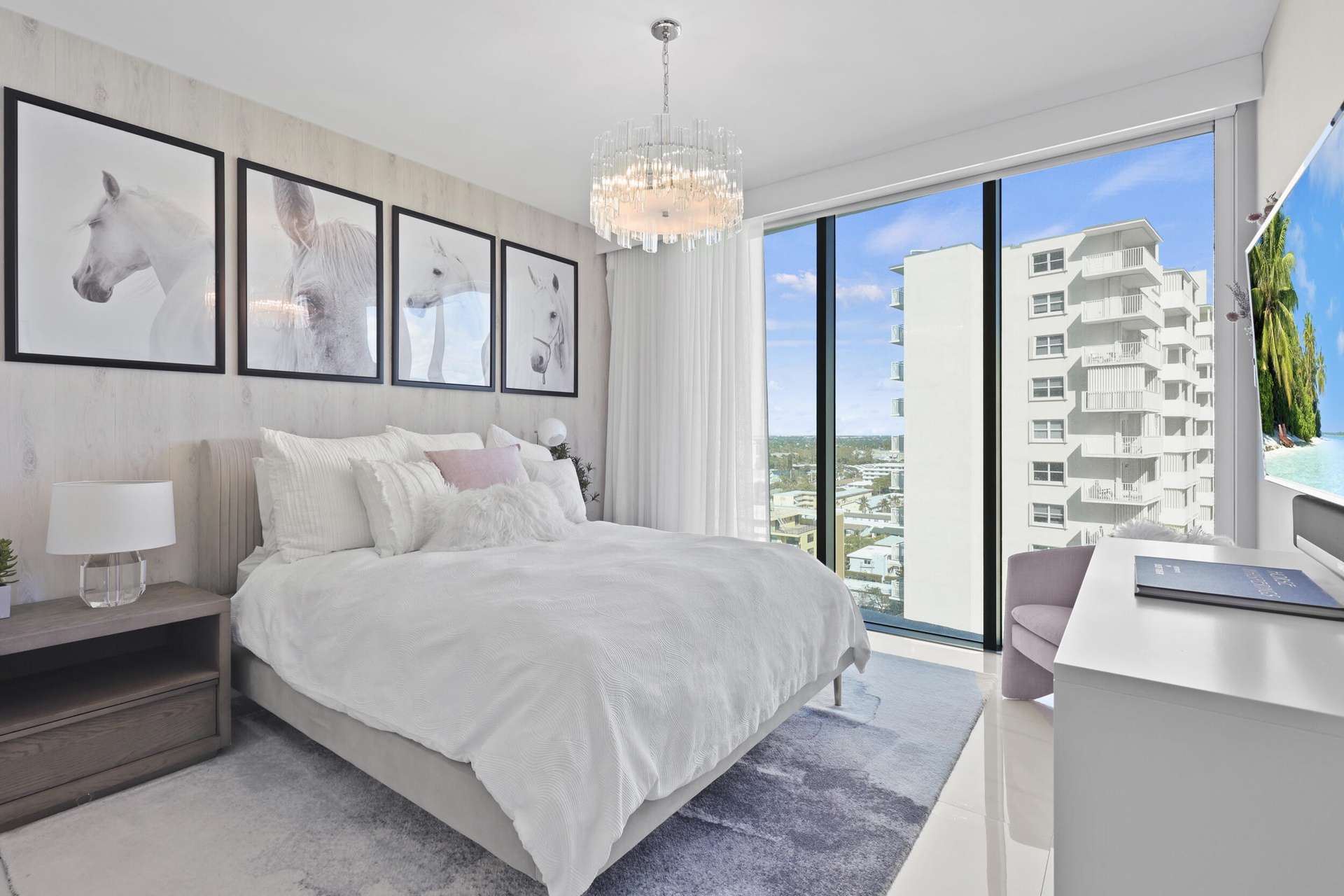Guest bedroom 1 features more designer touches, automated shades & blinds, customized closet, and ensuite bathroom.