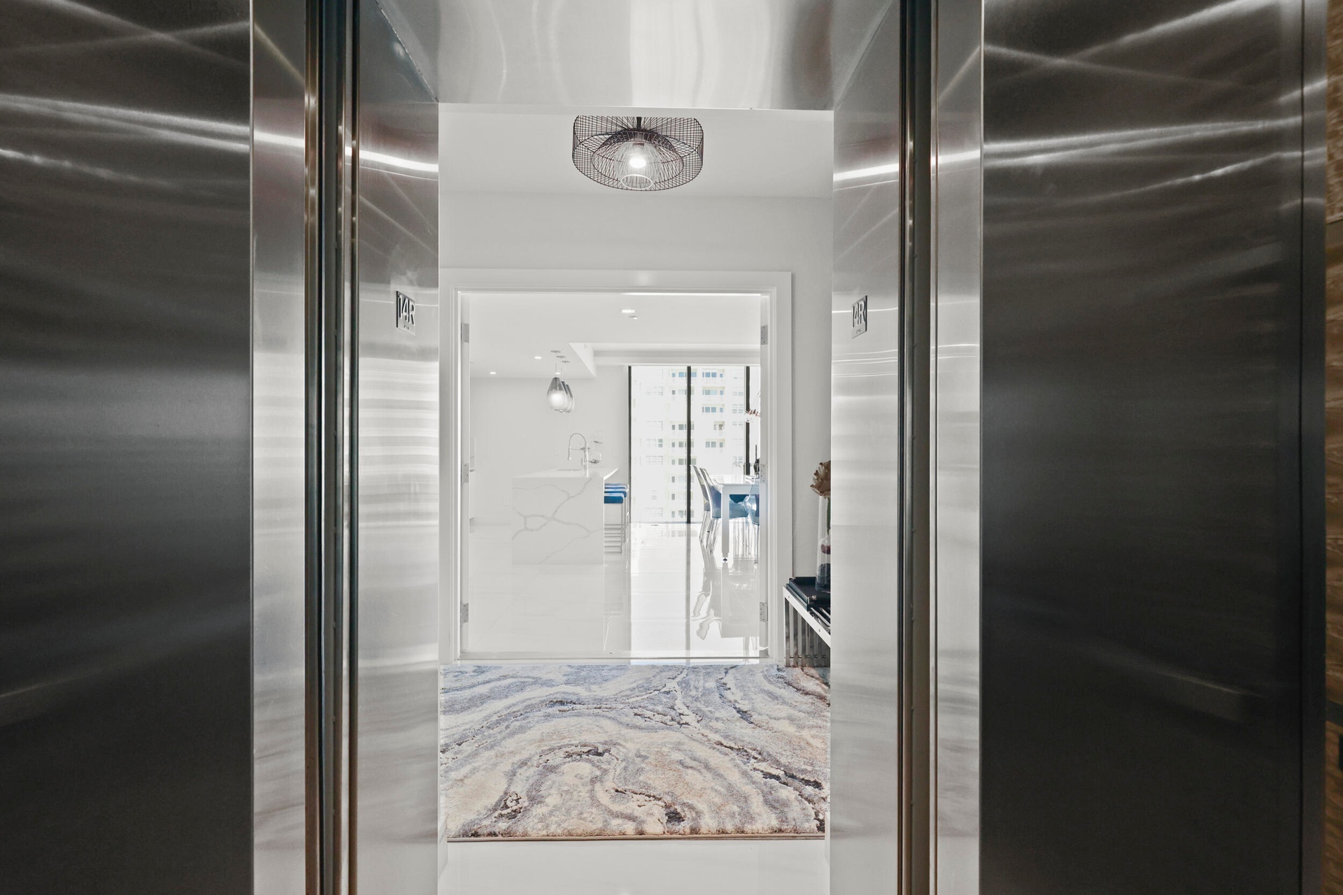 A private elevator escorts you to your 14th-floor residence overlooking the Atlantic Ocean.