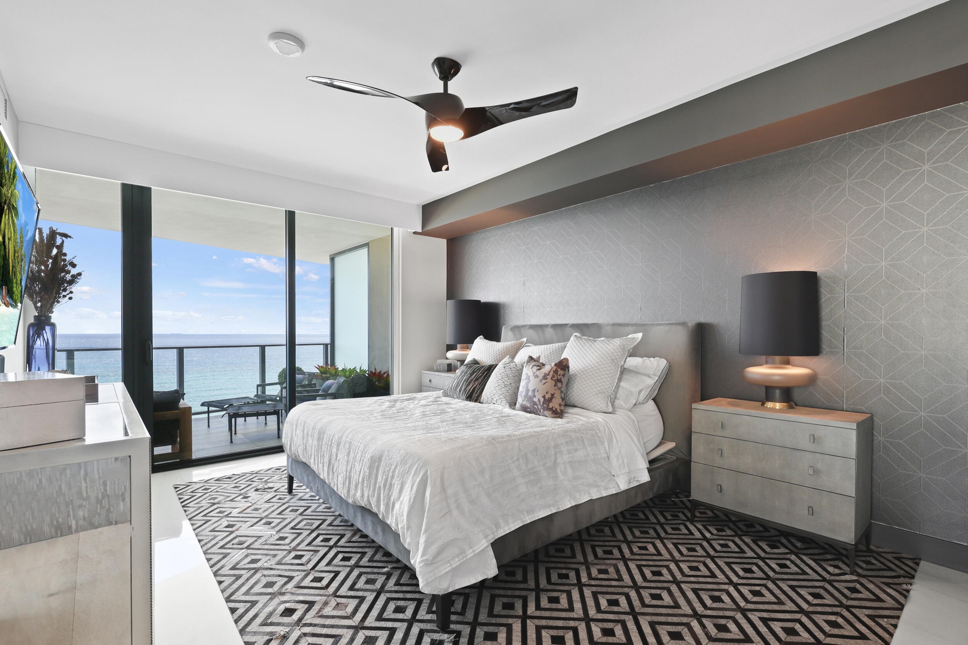 The primary suite is nothing short of spectacular, blending custom finishes and seamless automation with a sumptuous ensuite bathroom designed to feel