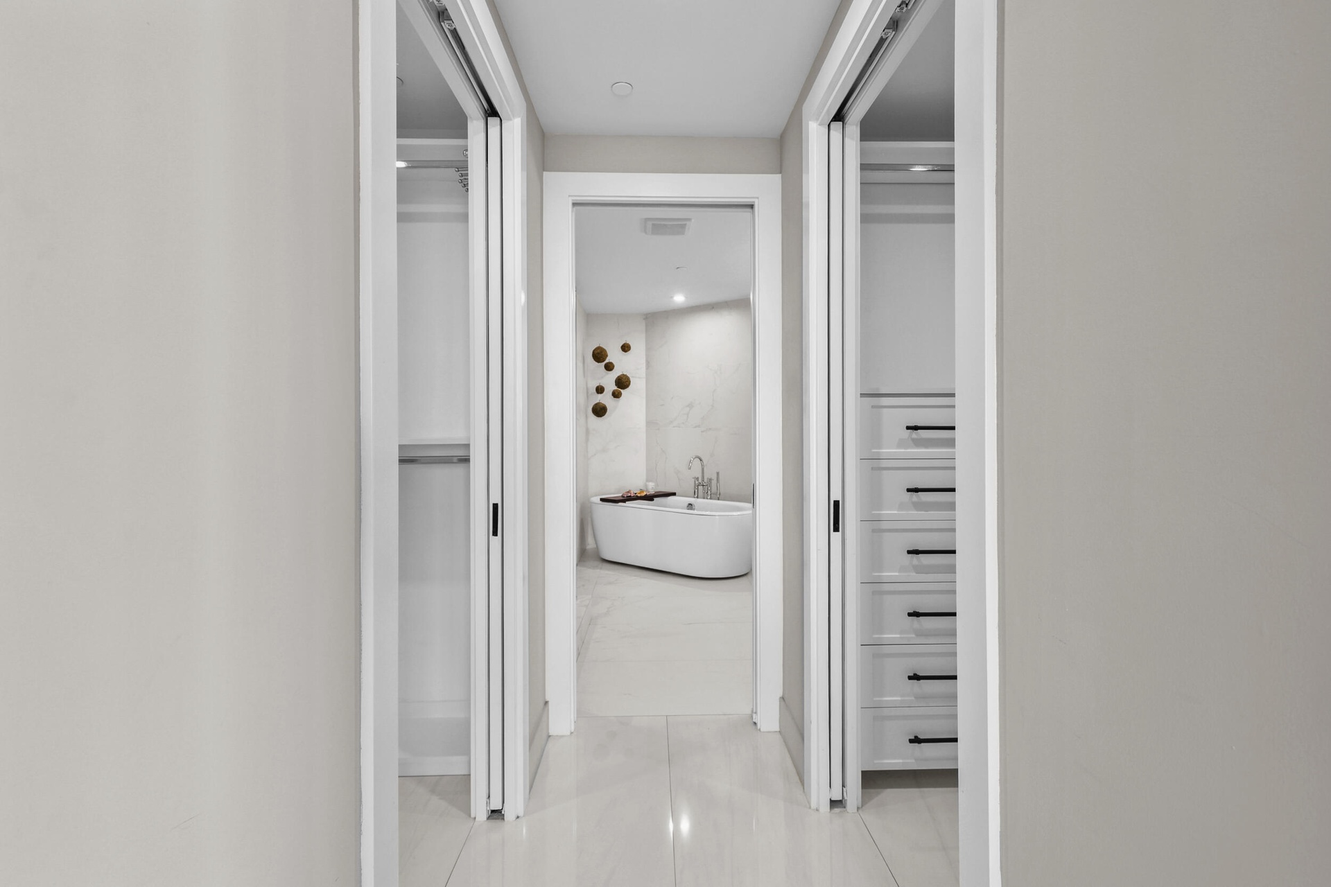 Step from your bedroom past fully customized his-and-hers closets and into a serene ensuite bathroom that feels like your own private spa, complete wi
