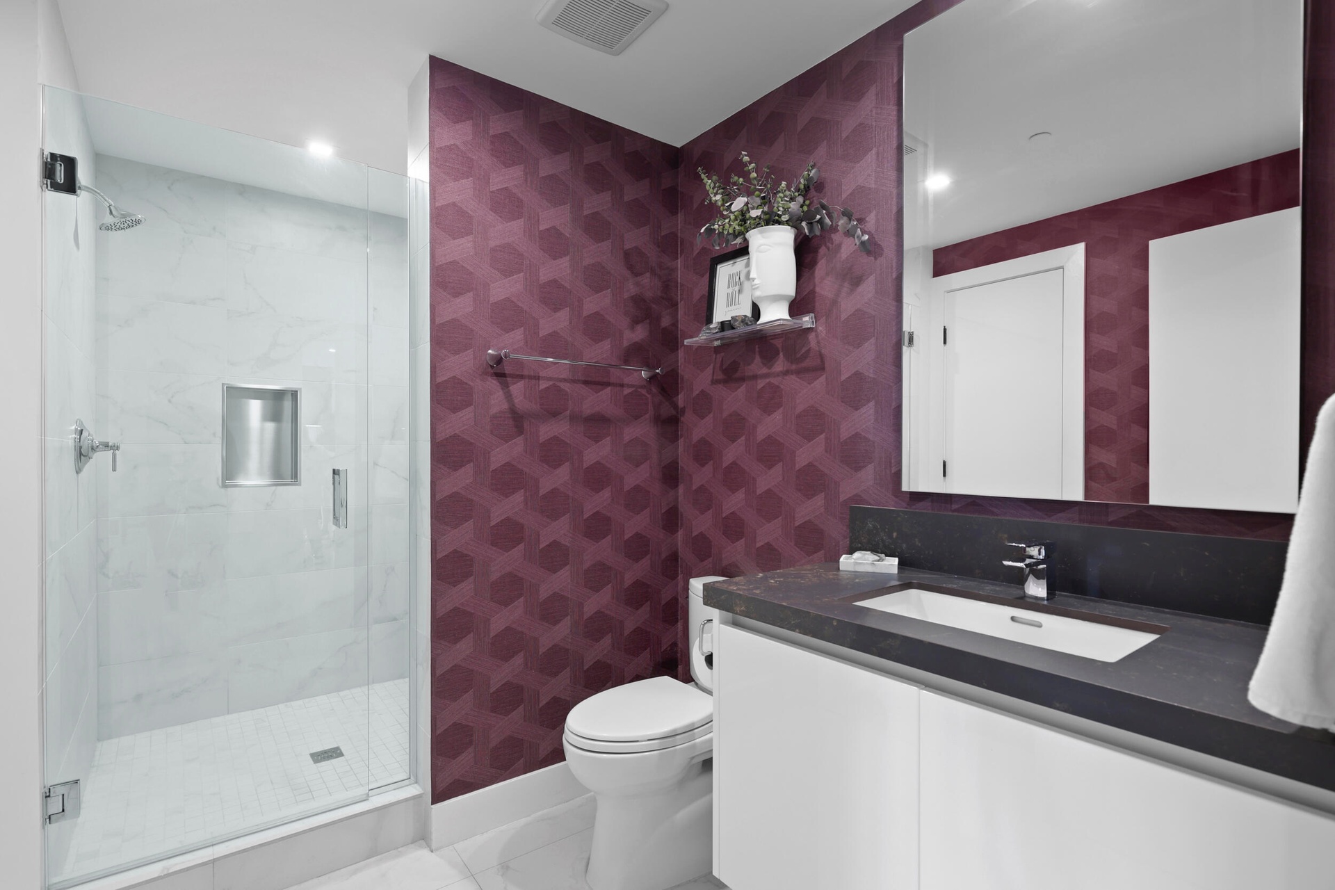 Bathroom 4 offers a designer flair with timeless elegance.
