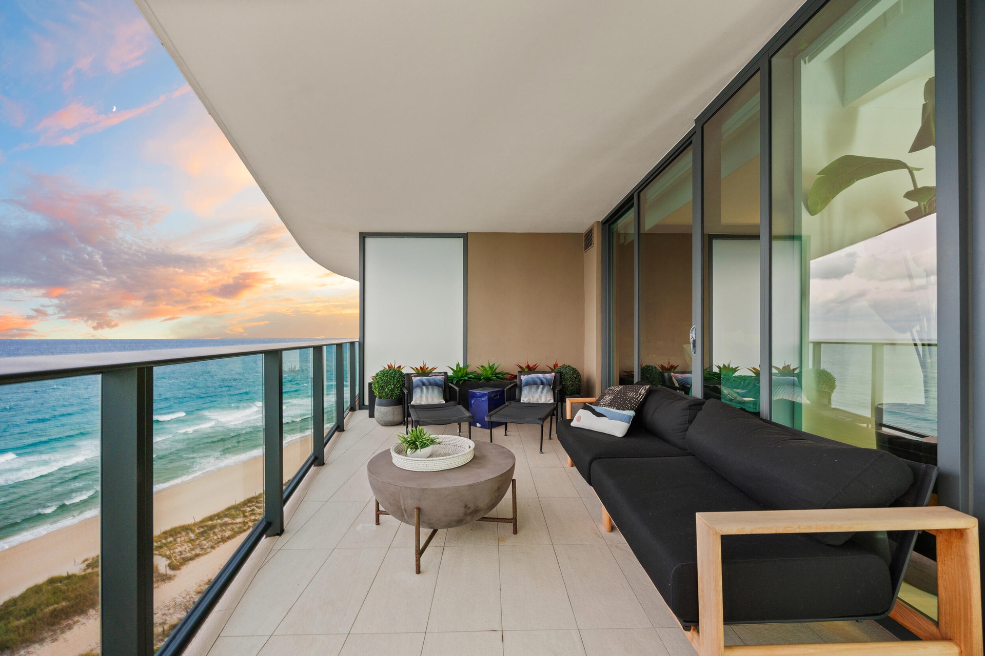 The expansive wraparound balcony offers an exceptional amount of outdoor living space and a peaceful setting to unwind with family and friends. As eve