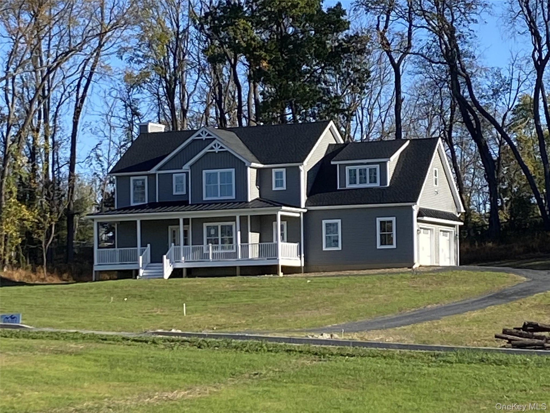 This thoughtfully designed new home inclusive of emerging landscaping is nearing completion.