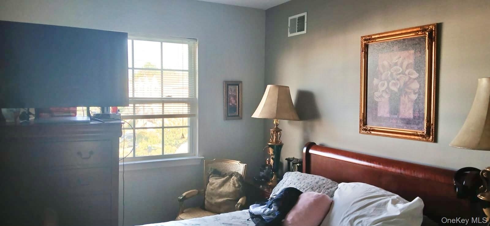 Multi-pane window featuring grid detailing and neutral-toned wall paint