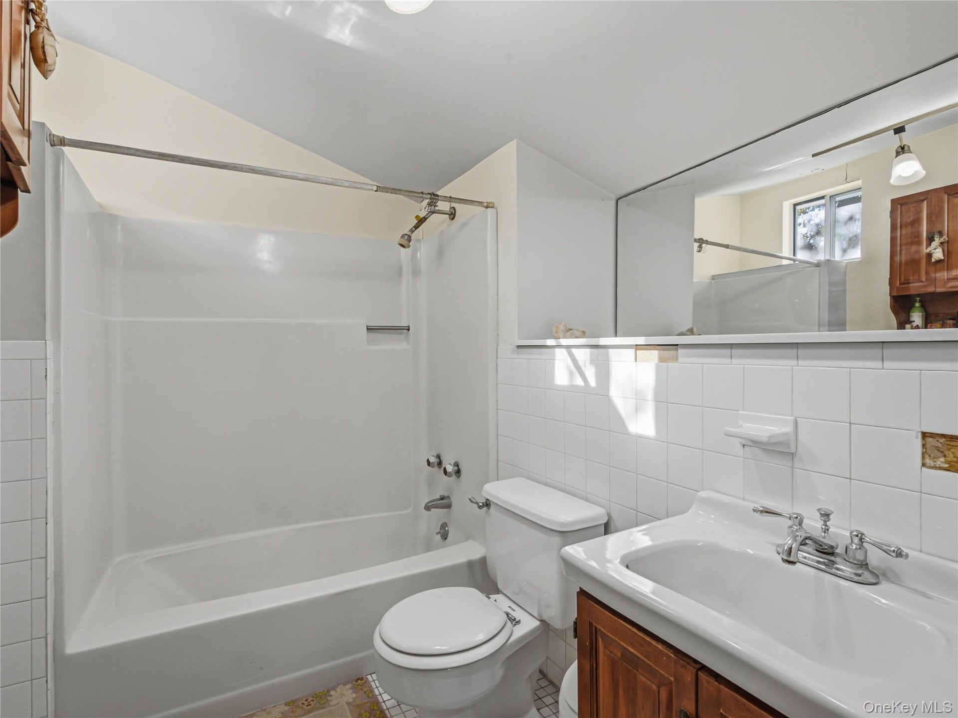 One of three full bathrooms