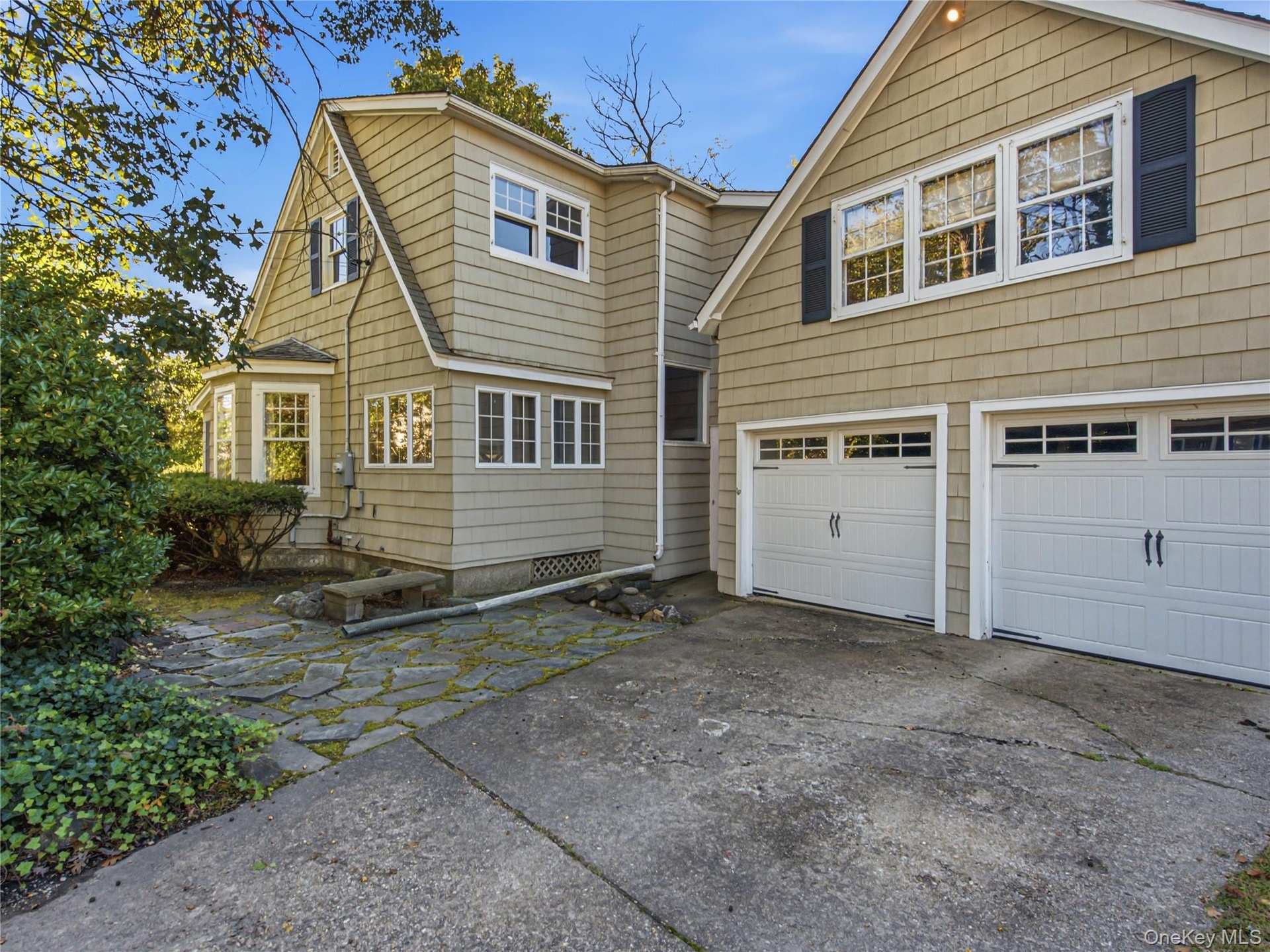 Two-car garage facing 18 Monroe Avenue.