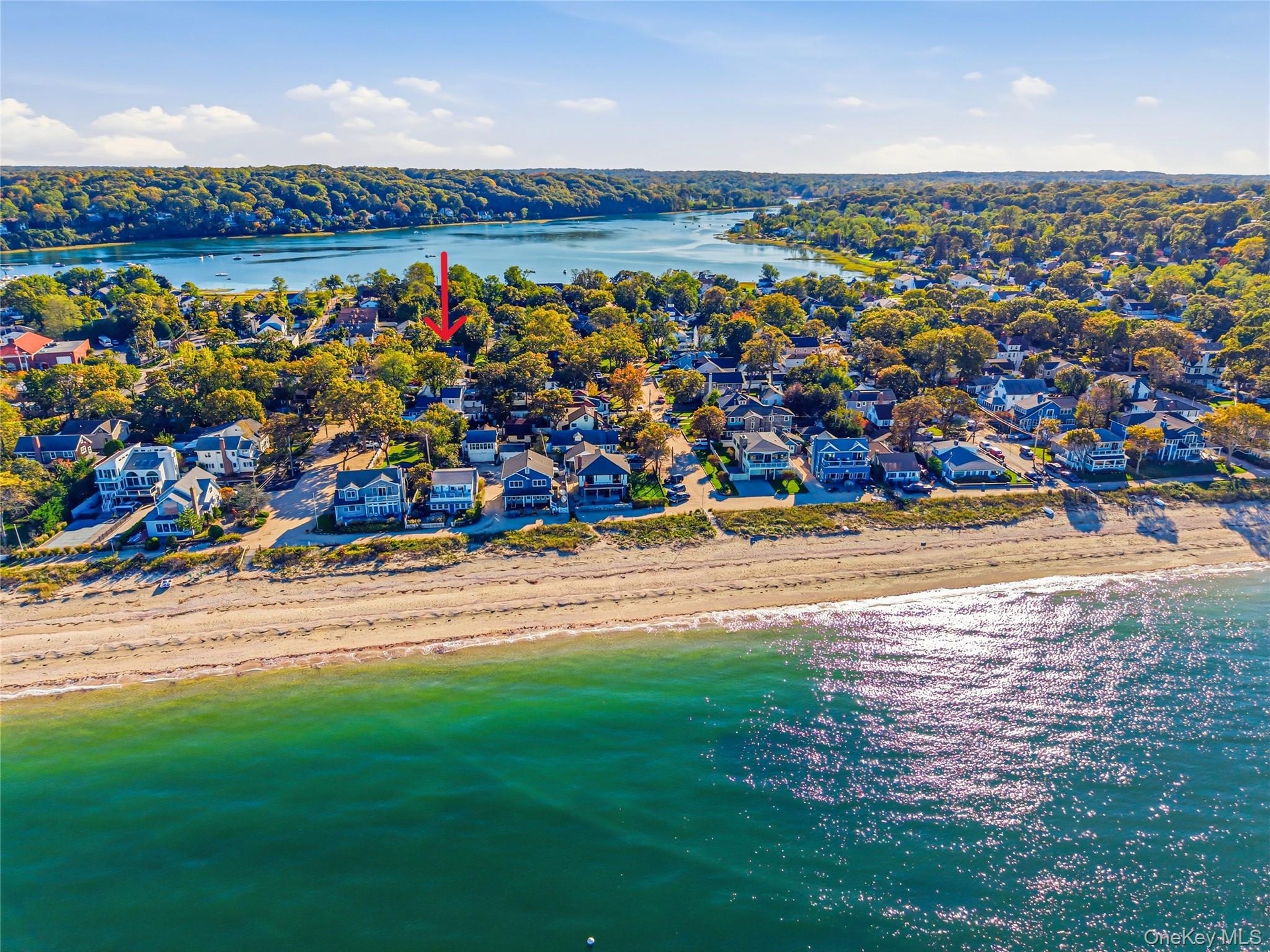 Aerial view of private beach and proximity to the water.