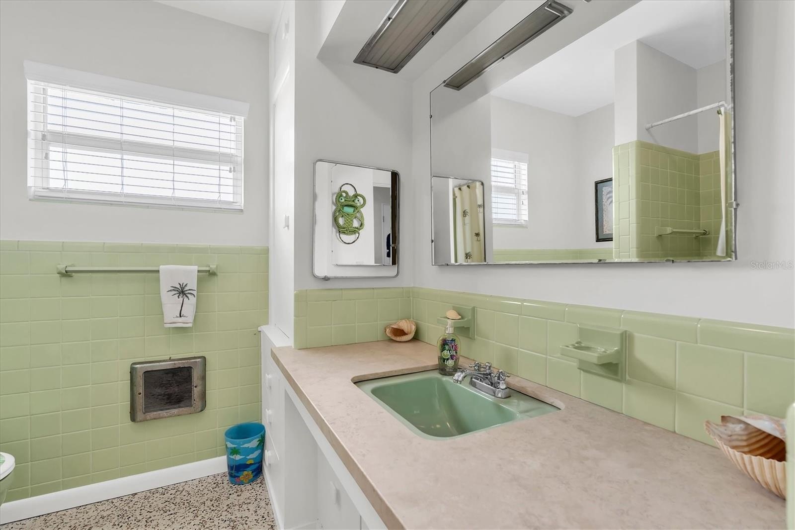guest bath has a tub/shower combo.