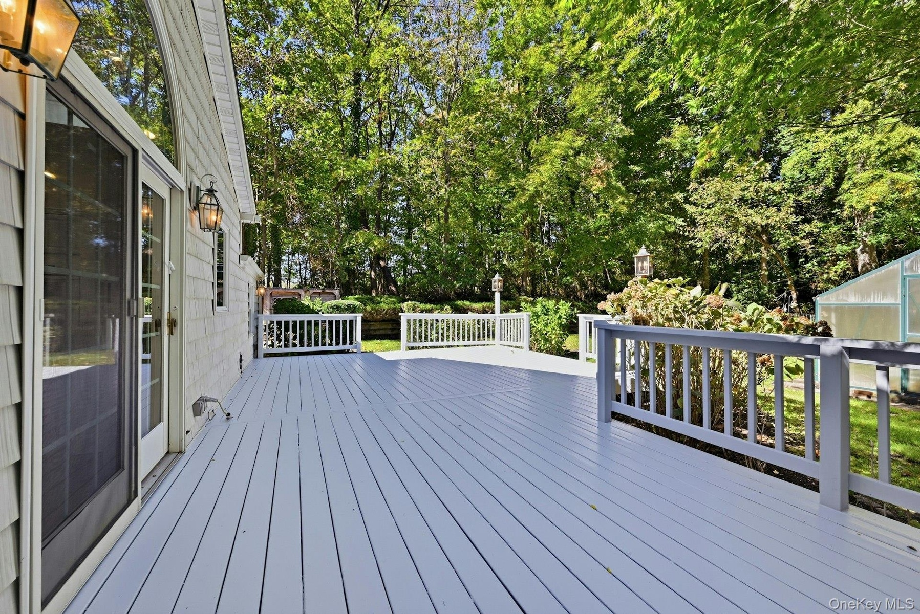 Cedar deck just painted. Exterior lighting.