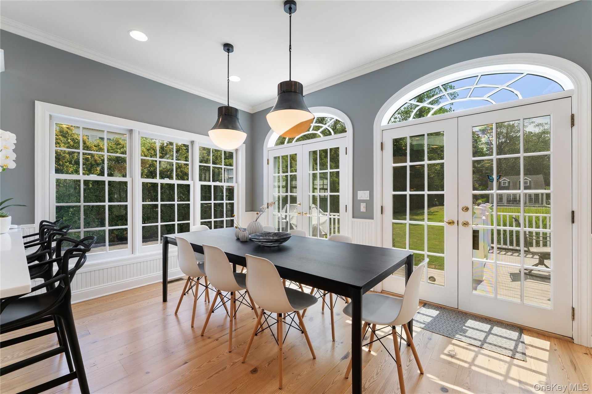 Fabulous breakfast area, high ceiling, French doors to deck and property