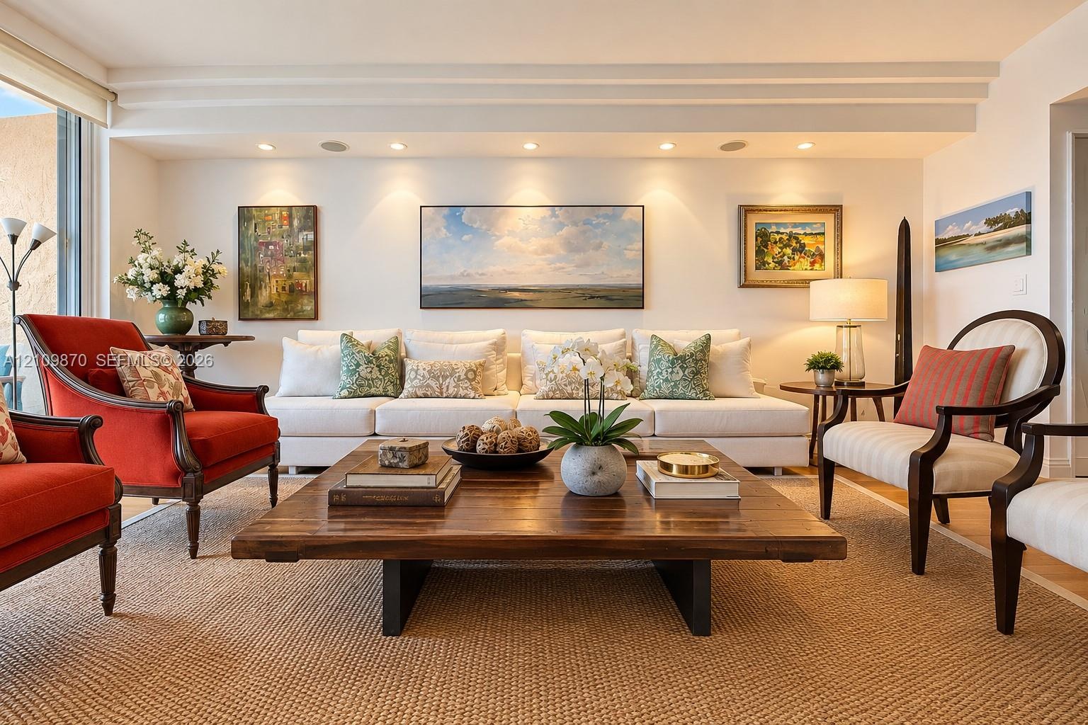 Living area featuring recessed ceiling lighting, crown molding, and wood-finish flooring