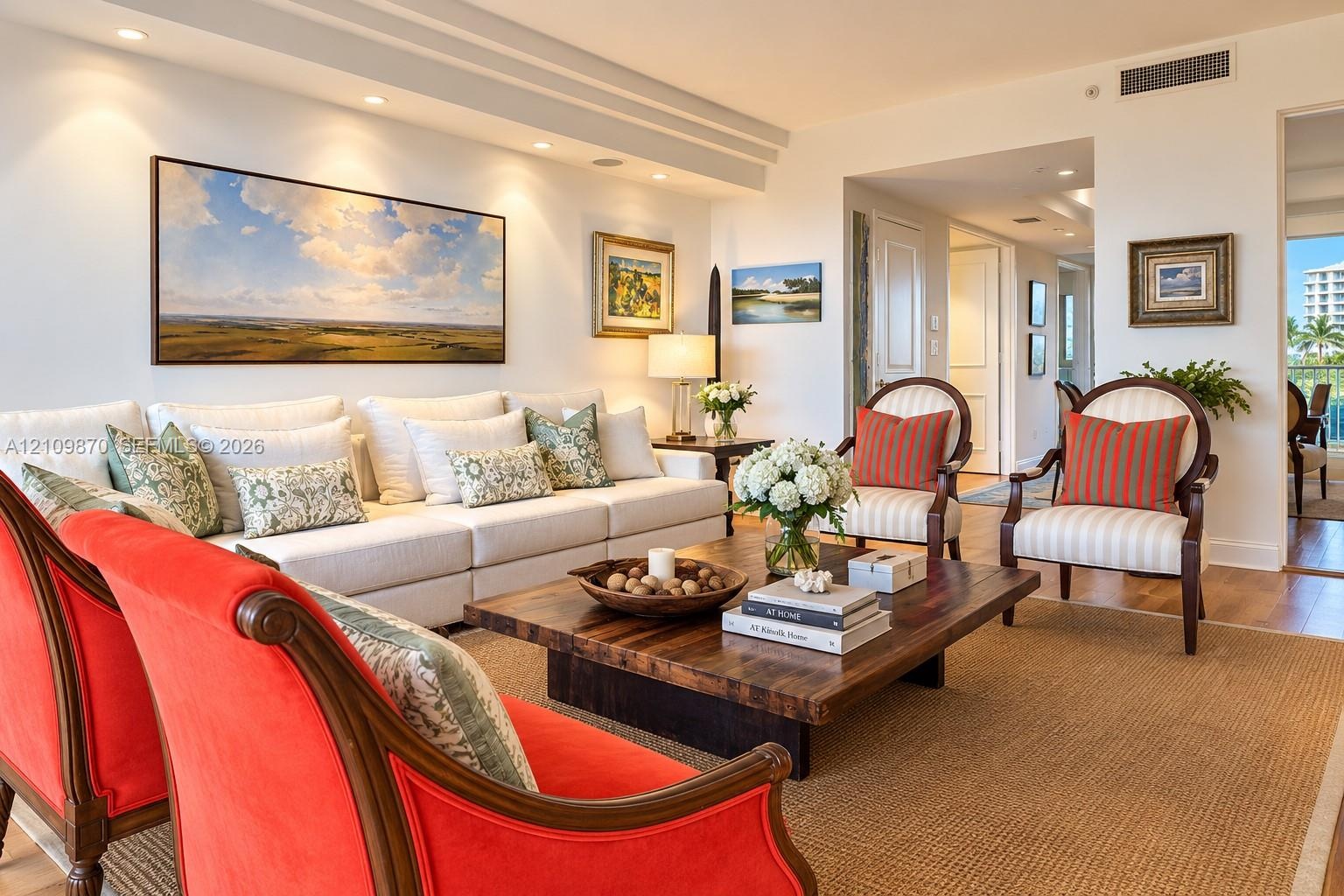 Recessed ceiling lighting, crown molding, and wood-finish flooring