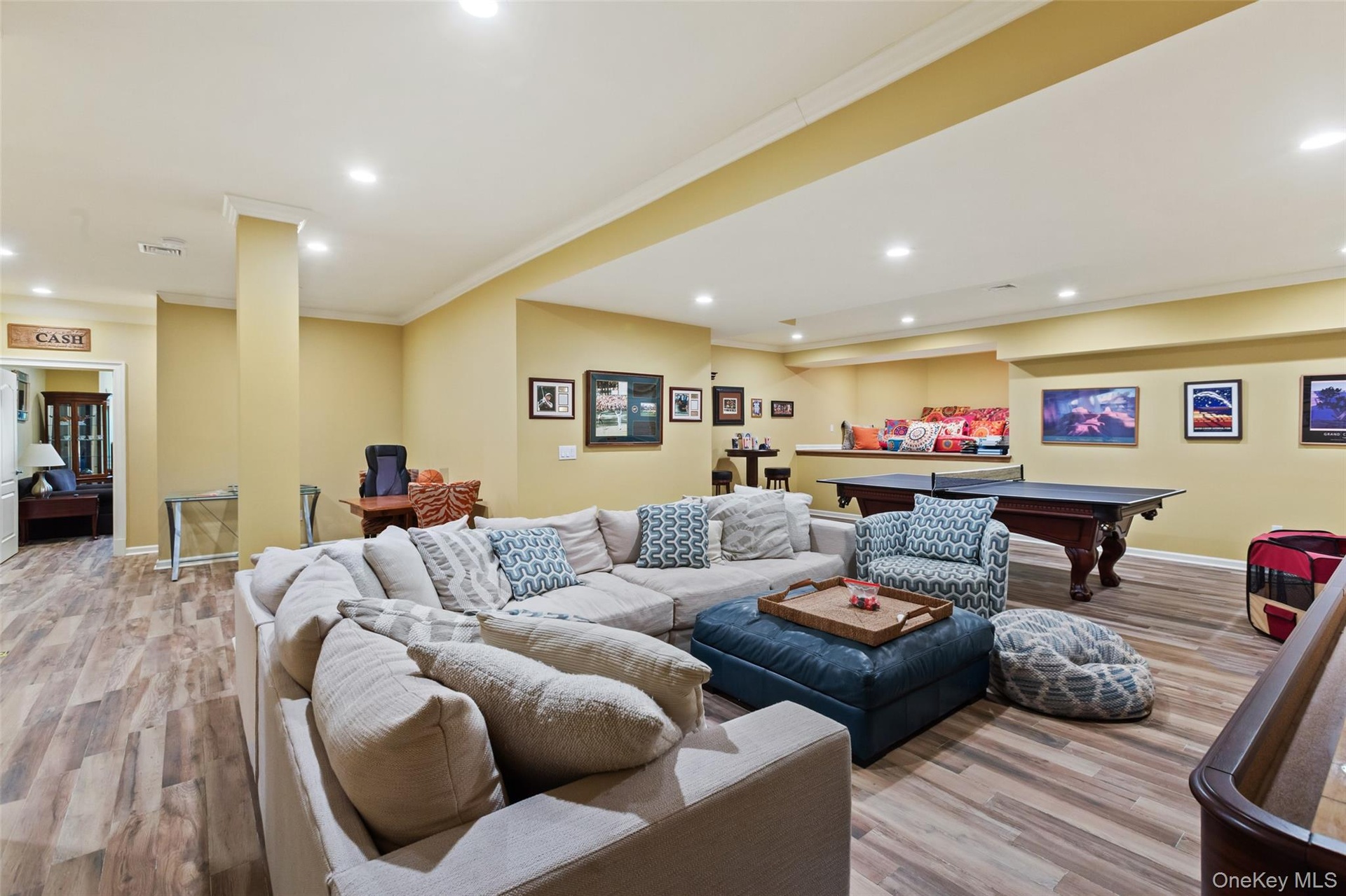 Recreation room featuring billiards, crown molding, recessed lighting, wood finished floors, and baseboards
