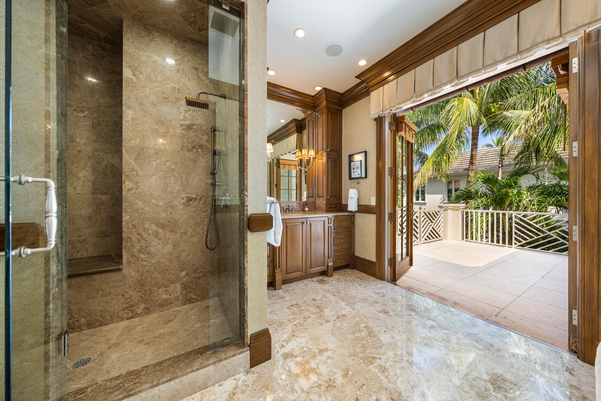 His Bathroom with adjoining balcony to her bathroom