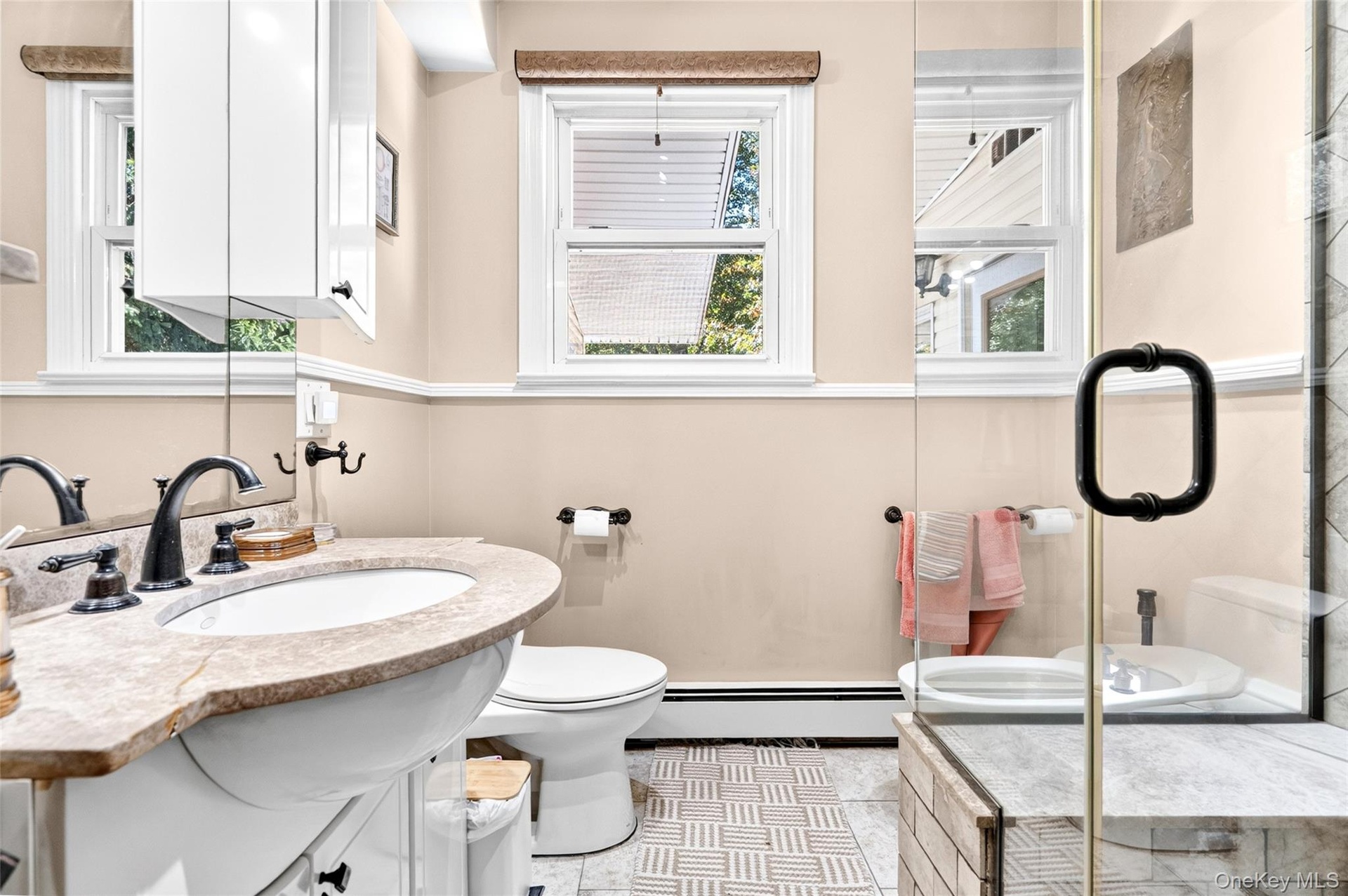 Large 1st floor Bedroom on the 1st Floor showing the beautiful shower stall and bedet.