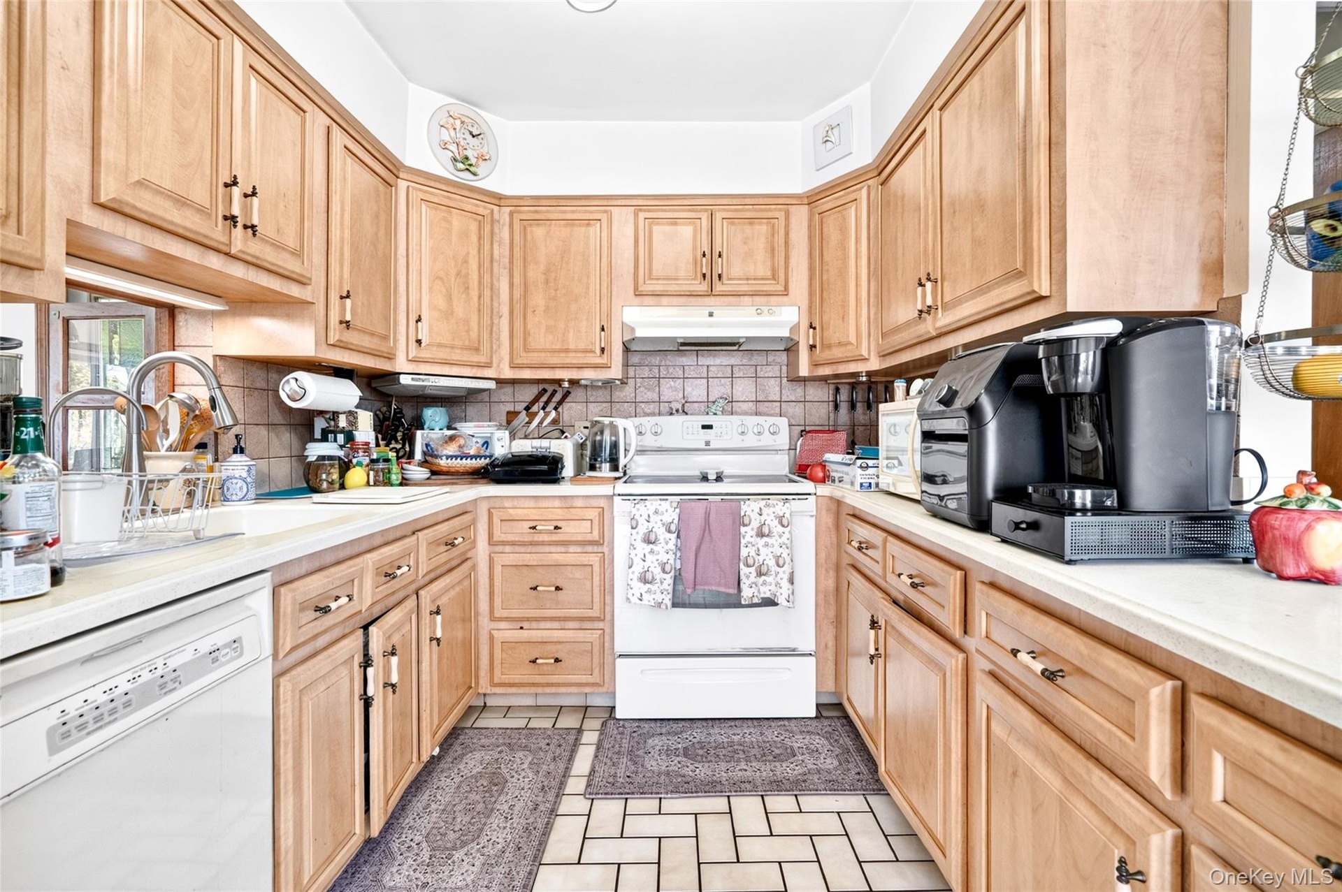 Another view of the Kitchen, showing the Convenient Pass Through Window to the Dining Room.