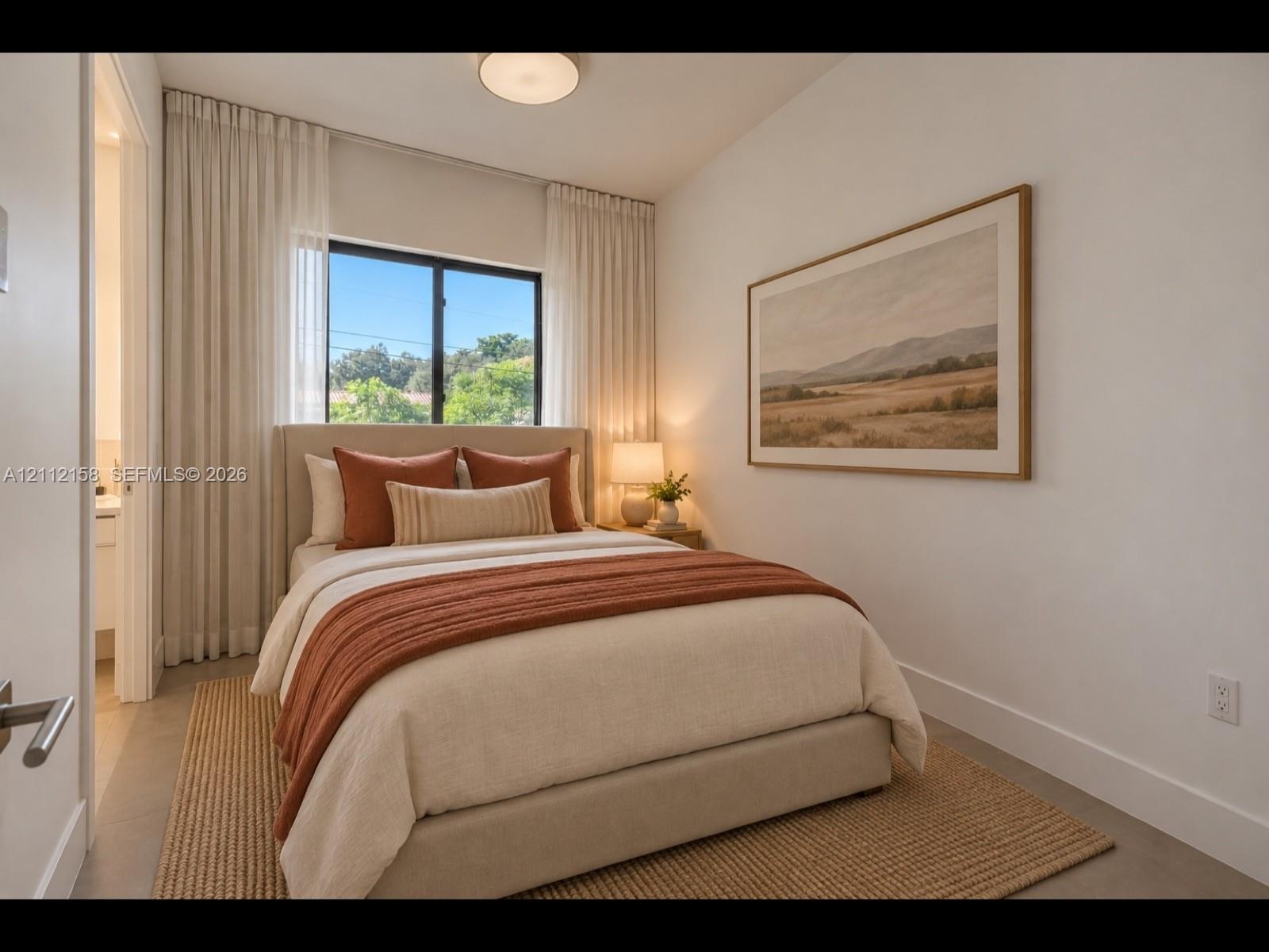 Serene bedroom with a large black-framed window, floor-to-ceiling drapery, and calming neutral tones