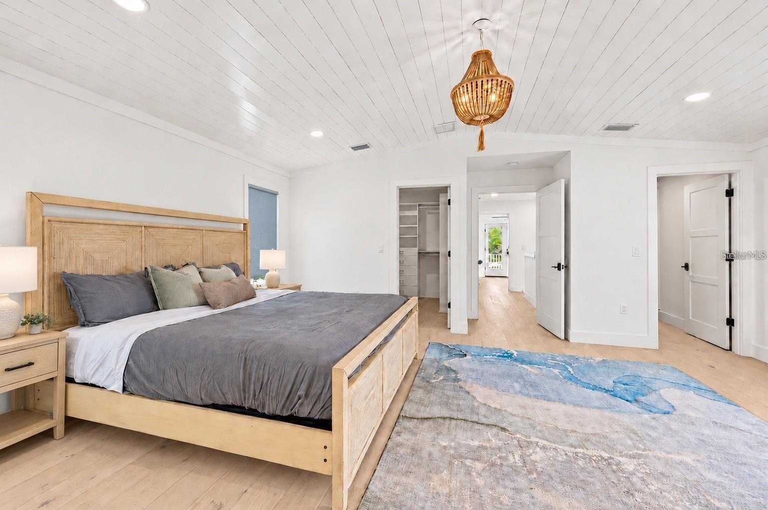 Primary suite with vaulted ceiling