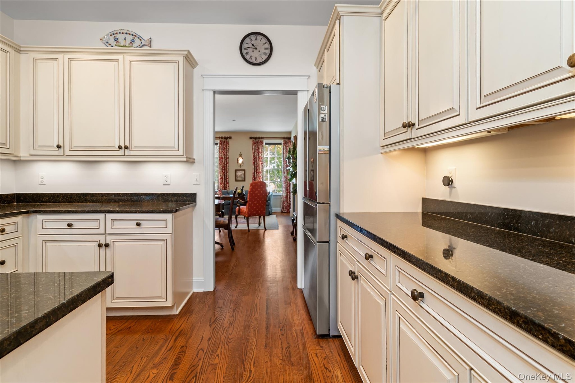 The counter and cabinets on the right remind me of a butler's pantry.  And this one is yours!