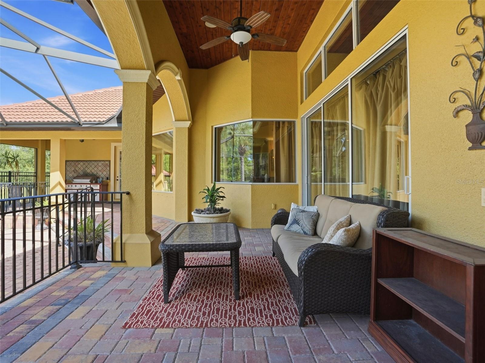Outdoor covered lanai overlooking the pool to enjoy your Florida lifestyle! Complete privacy from any neighbors!