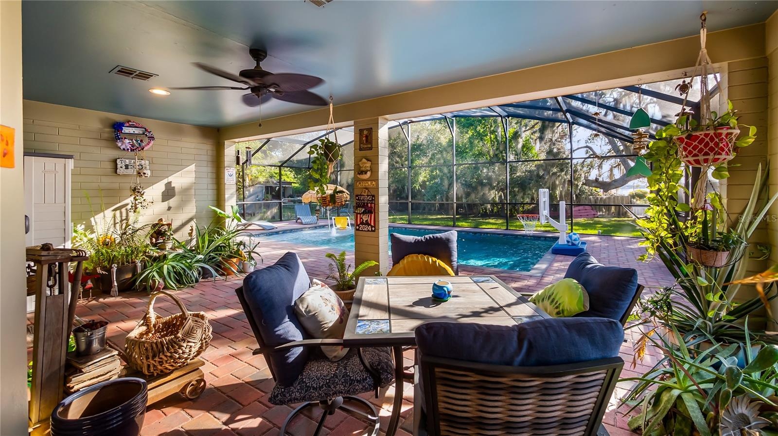 2 sets of sliders from great room to rear covered porch/pool added in 2023