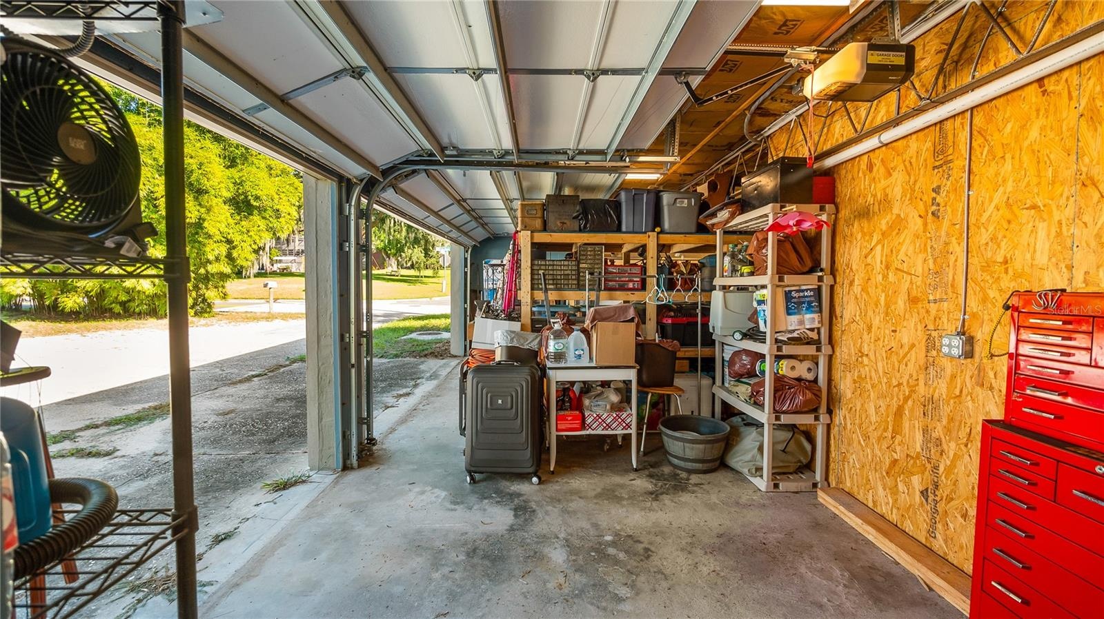 Detached garage and apartment. 2 car parking plus storage. Driveway off Lakeshore drive, little fenced in back yard. Full kitchen, laundry closet. rem