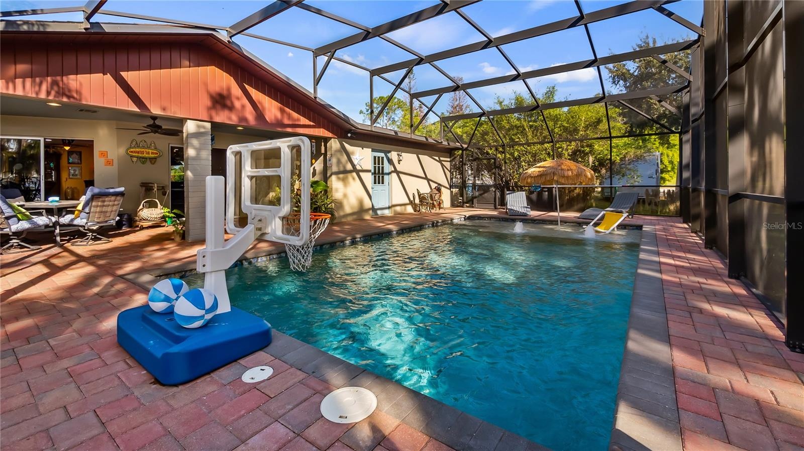 2 sets of sliders from great room to rear covered porch/pool added in late 2022