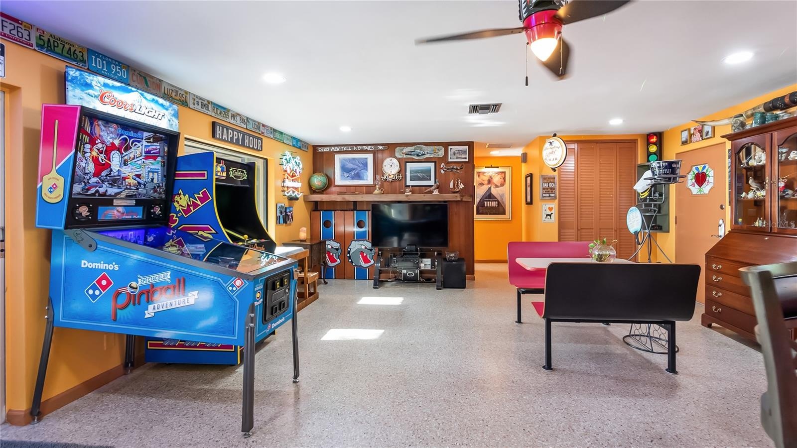 Main Home - Great room/kitchen/living room combo: Living room used as gathering space for game room fun. Two Sliders go out to covered back porch and 