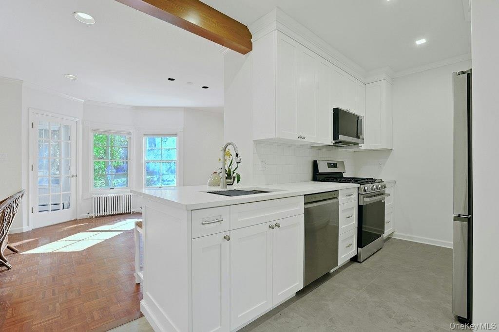 1st Fl Kitchen - new finishes makes it a pleasure to cook and serve!