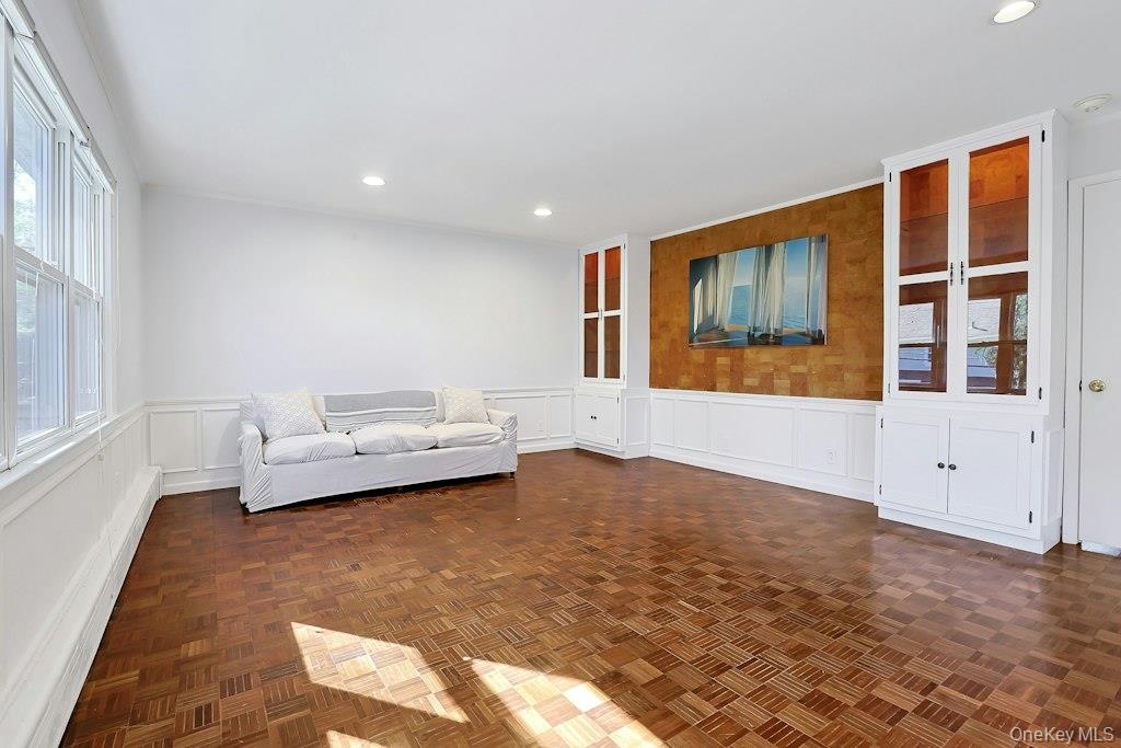 Second Floor - Living Room #2, Refreshed wood floors, Built in cabinets.