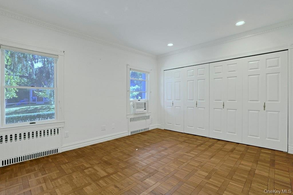 First Floor - Primary Bedroom (#1), wall of closets
