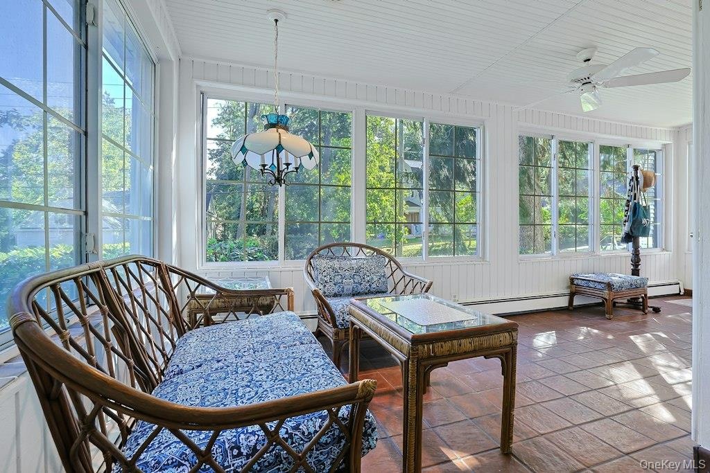The two entrances meet in a huge wrap around sunroom!