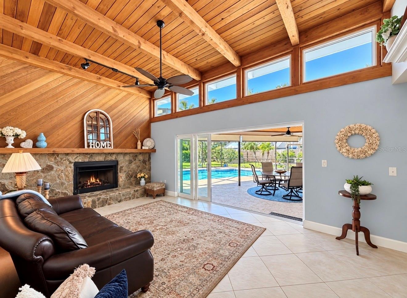 Family room with natural light and fireplace