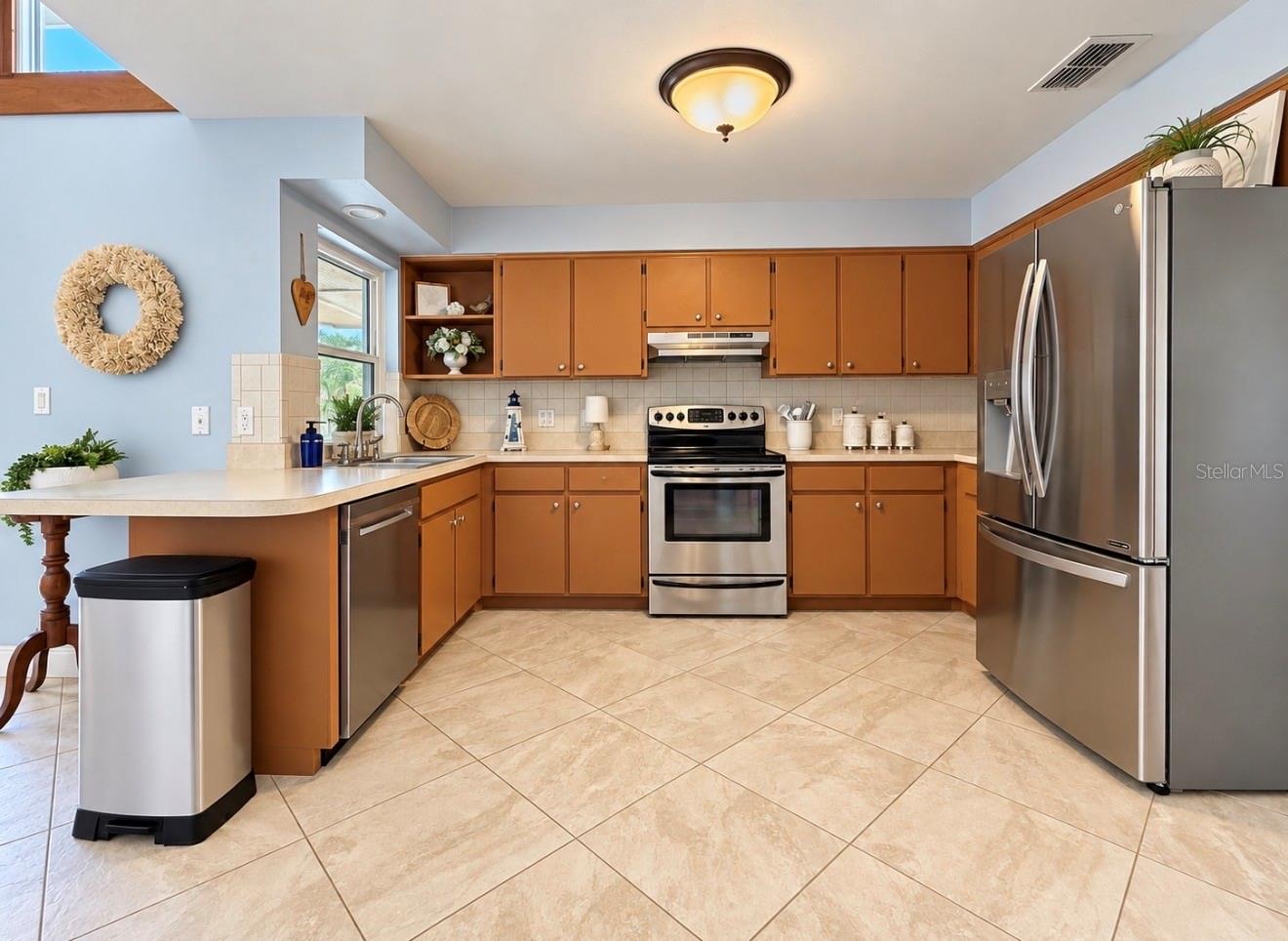 Kitchen with stainless steel appliances