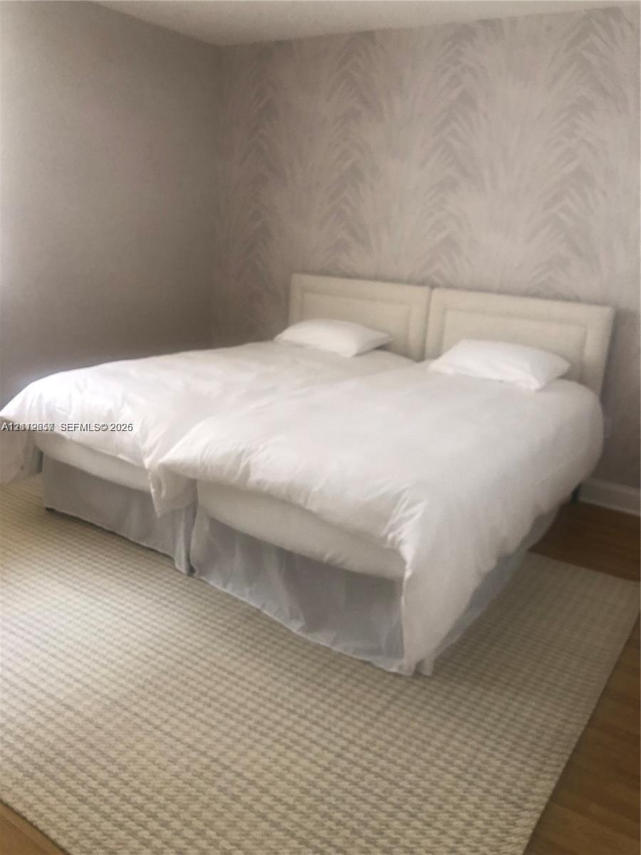 Textured wall covering and wood-finish flooring