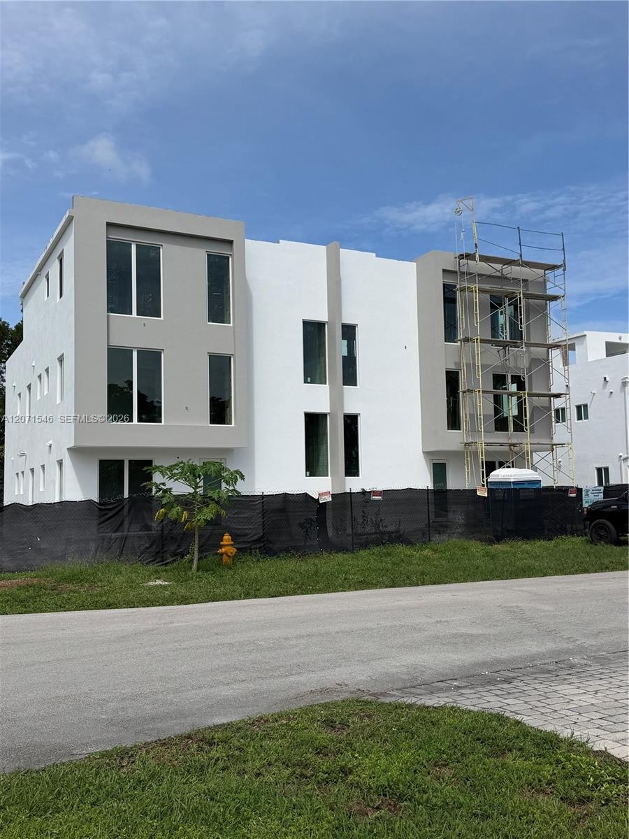 New Multi- Family Construction, Right Next Store